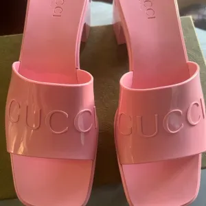 100 authentic Gucci PVC slides with heels (39)
