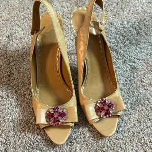 Beautifully adorned J Vincent heels. Rhinestones and golden heel accents 8.5