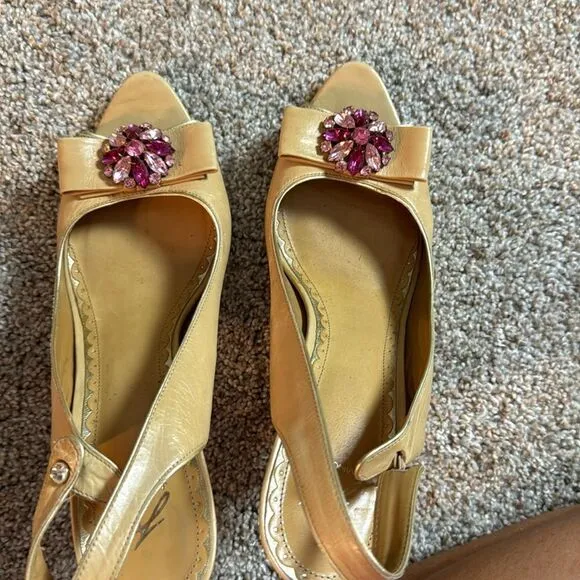 Beautifully adorned J Vincent heels. Rhinestones and golden heel accents 8.5