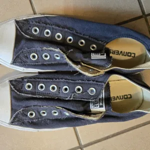 Converse Chuck Taylor Slip On Canvas Sneakers.