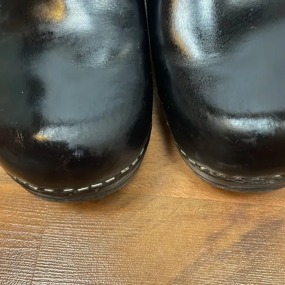 Dansko black leather clogs