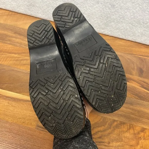 Dansko black leather clogs