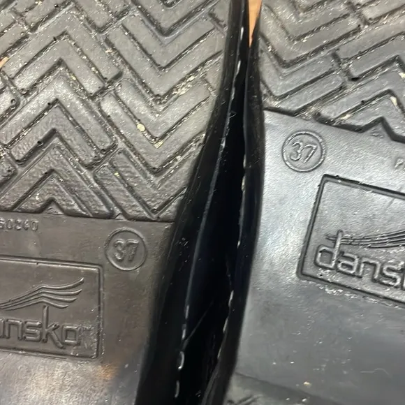 Dansko black leather clogs