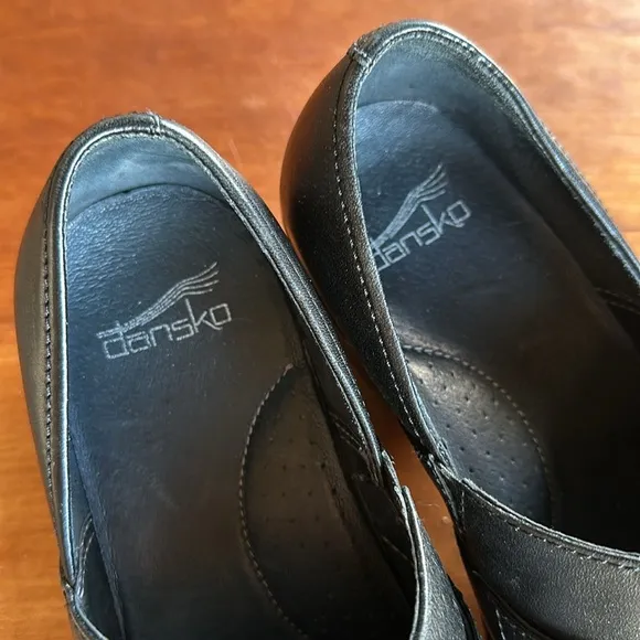 Dansko Tamara black leather belted closed back clogs. Size Euro 38/USA 8