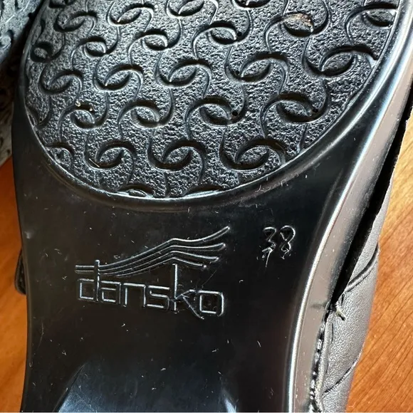 Dansko Tamara black leather belted closed back clogs. Size Euro 38/USA 8