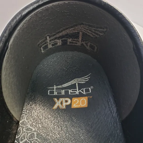 Dansko XP 2.0 black patent leather clogs