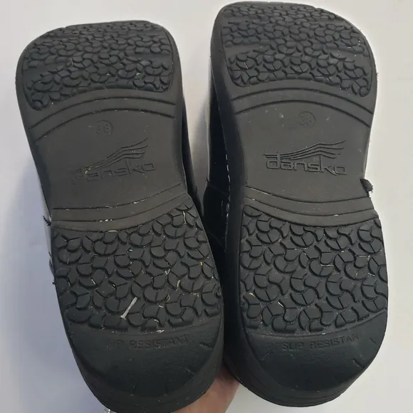 Dansko XP 2.0 black patent leather clogs