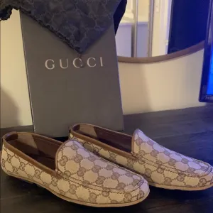 Gucci Brown Canvas Monogram Flats
