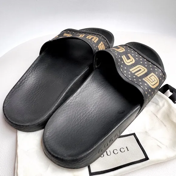 GUCCI ‘guccy’ logo gold black rubber pool slides 38