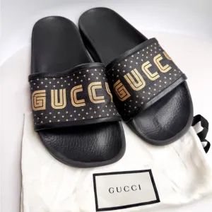GUCCI ‘guccy’ logo gold black rubber pool slides 38