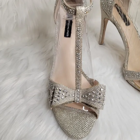 INC Silver rhinestones open toe bow heels.
