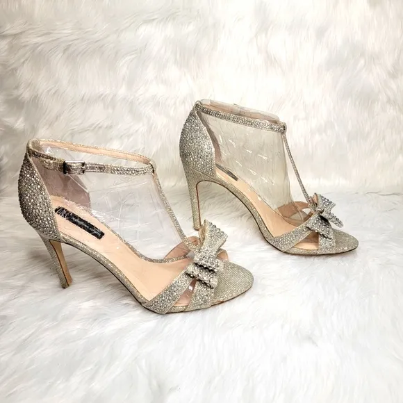 INC Silver rhinestones open toe bow heels.