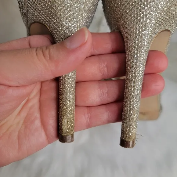 INC Silver rhinestones open toe bow heels.