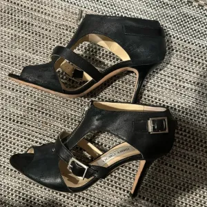 Jimmy Choo distressed leather heels with center zipper, strap with buckle