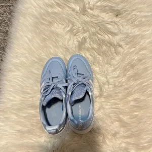 Light blue adidas sneakers