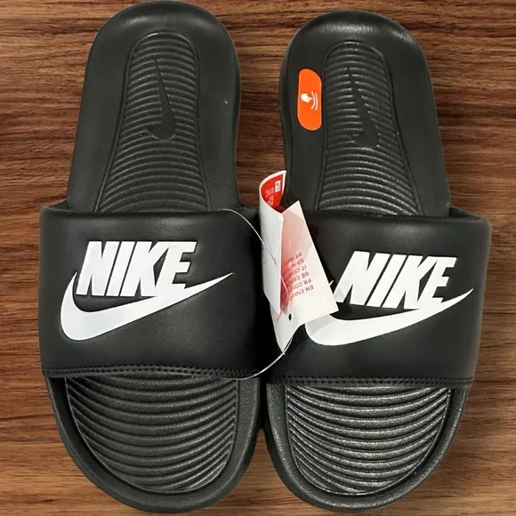 Men’s Nike Victori One Slides in Black with Nike Logo on Padded Vamp, Size 7.