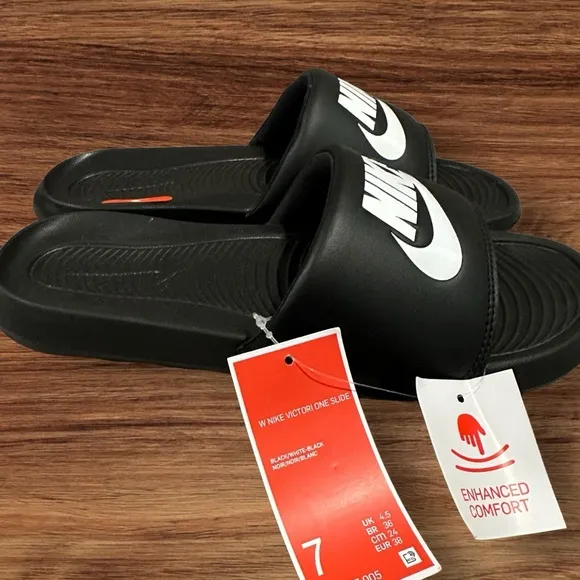 Men’s Nike Victori One Slides in Black with Nike Logo on Padded Vamp, Size 7.