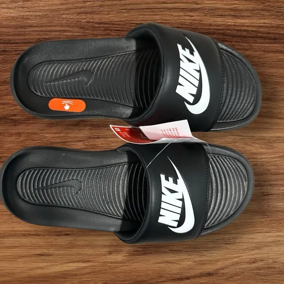 Men’s Nike Victori One Slides in Black with Nike Logo on Padded Vamp, Size 7.