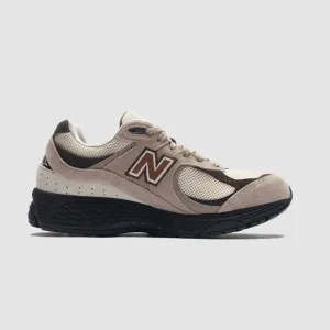 New Balance 2002r Tan and Black Athletic Shoes with Supportive Design
