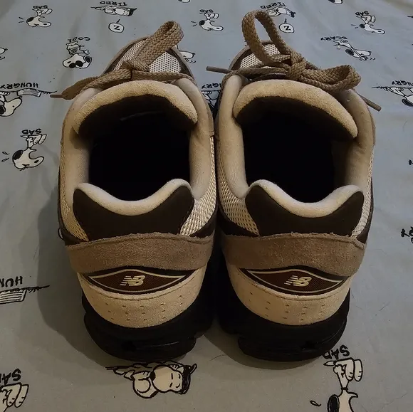 New Balance 2002r Tan and Black Athletic Shoes with Supportive Design