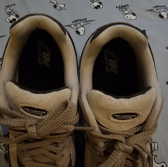 New Balance 2002r Tan and Black Athletic Shoes with Supportive Design
