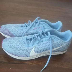 Nike Blue and White Athletic Shoes Lightweight Mesh Design