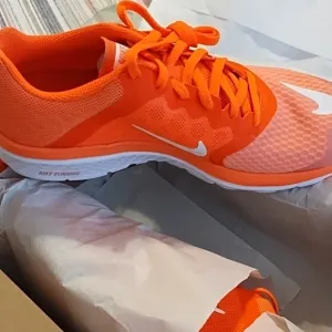 Nike Orange Running Shoes new in box 8.5