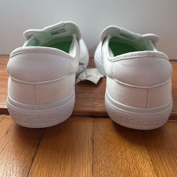 NWT unisex Adidas Vulc Raid3r slip on shoe in white canvas