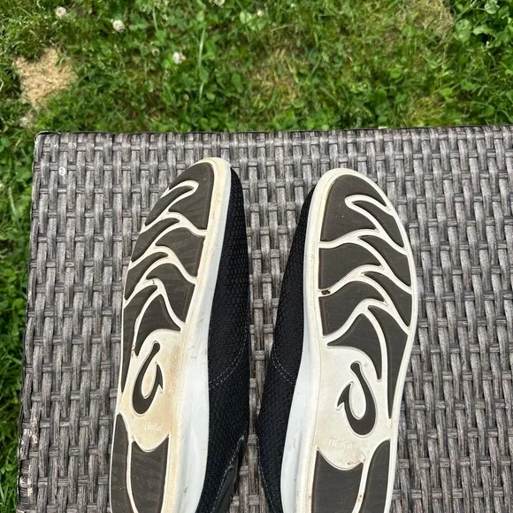 OluKai Black Sneakers with Breathable Mesh and Slip-On Design