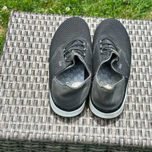 OluKai Black Sneakers with Breathable Mesh and Slip-On Design