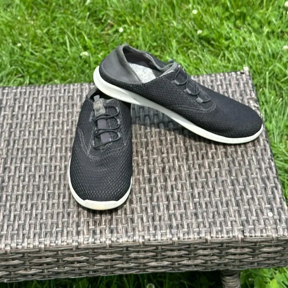 OluKai Black Sneakers with Breathable Mesh and Slip-On Design