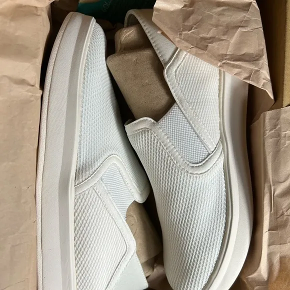 Olukai Ki‘ihele Slip-On Sneaker (Womenn) in bright white