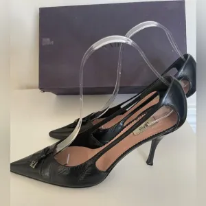 Prada Black Pointed Heels With Open Sides 38.5 Gorgeous.  Classic. Pointed toe.