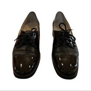 Salvatore Ferragamo Oxford lace up shoe, black patent leather and pebble leather