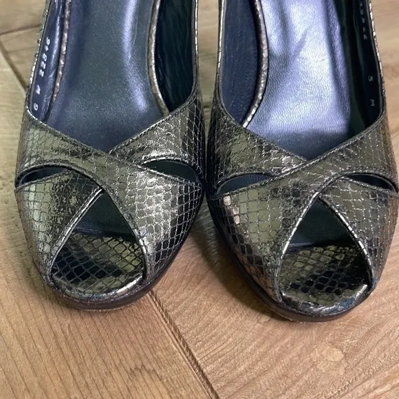 Stuart Weitzman Pewter colored peep toe heels. Size 5
