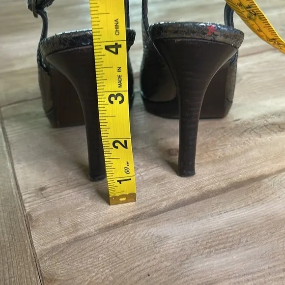 Stuart Weitzman Pewter colored peep toe heels. Size 5