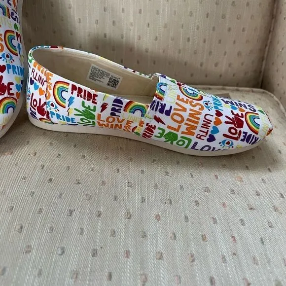 𝅺TOMS Belmont white multi unity print slip ons sneakers size 9M  pride r…